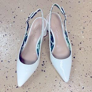 A white slingback heels from The Kelly & Katie